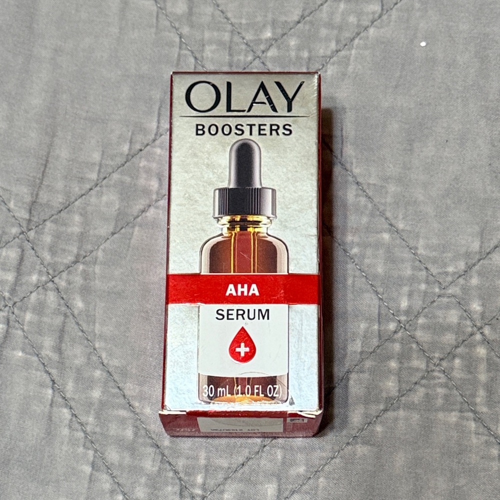 OLAY AHA Serum with Red and Black Accents